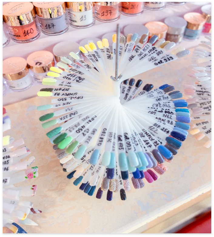 Fanned wheel of numbered SNS and gel colour swatch sticks