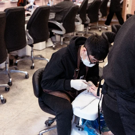 The salon floor in full swing, technicians working